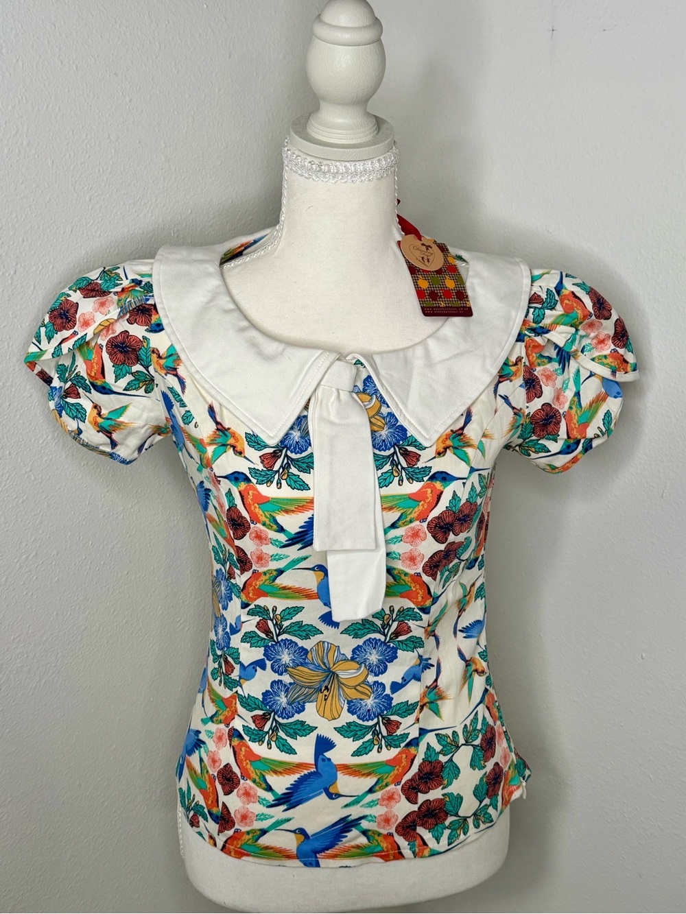 BannedApparel White Blouse with Multicolor Hummingbird & Floral Print Size Small
